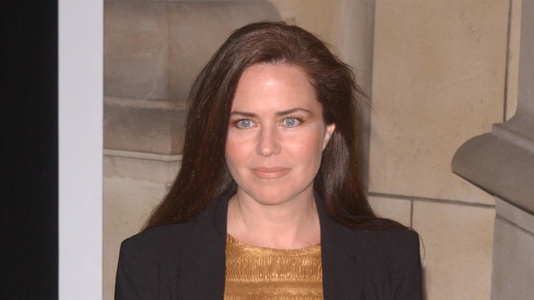 Koo Stark looking forward black jacket