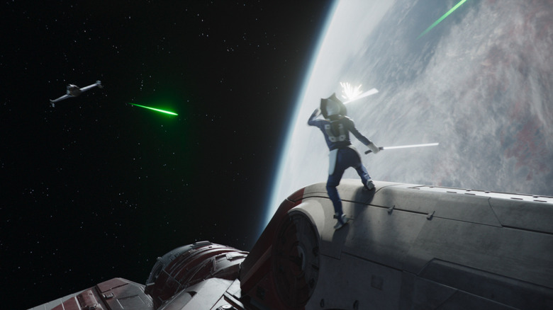 Ahsoka deflecting enemy fire in space