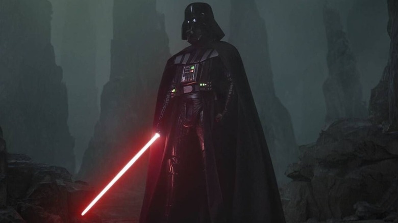 Darth Vader holding red lightsaber