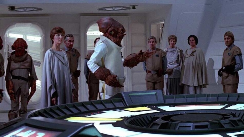 Mon Mothma, Admiral Ackbar, and other rebel leaders at a meeting in Return of the Jedi (1983)