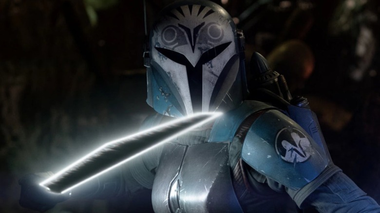 Bo-Katan holding the Darksaber