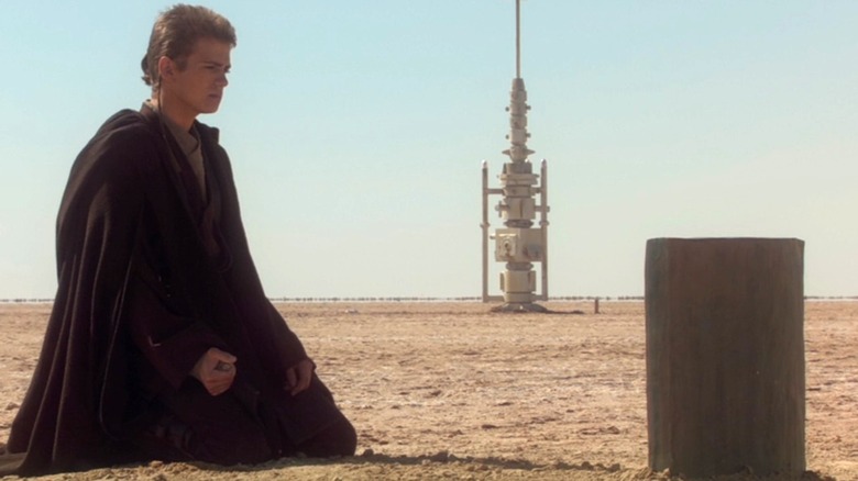 Anakin Skywalker kneeling before gave