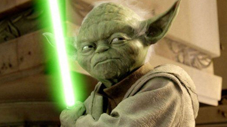 Yoda with lightsaber