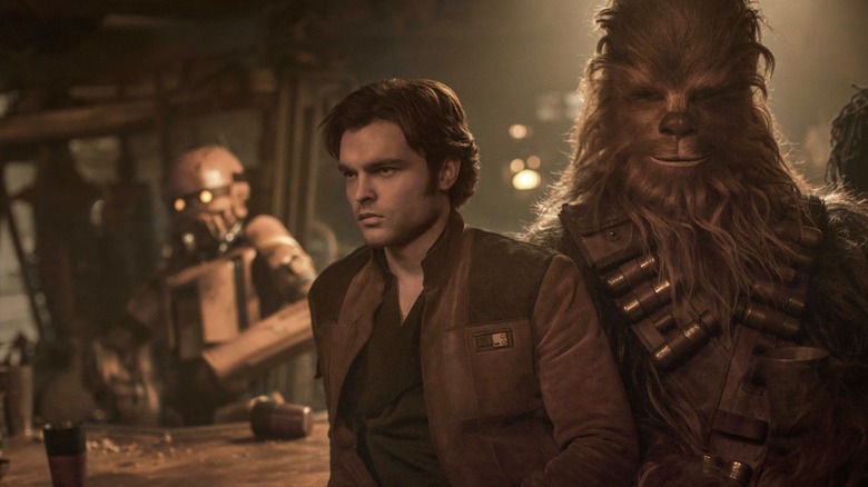 Han Solo and Chewbacca at a bar in "Solo: A Star Wars Story" (2018)
