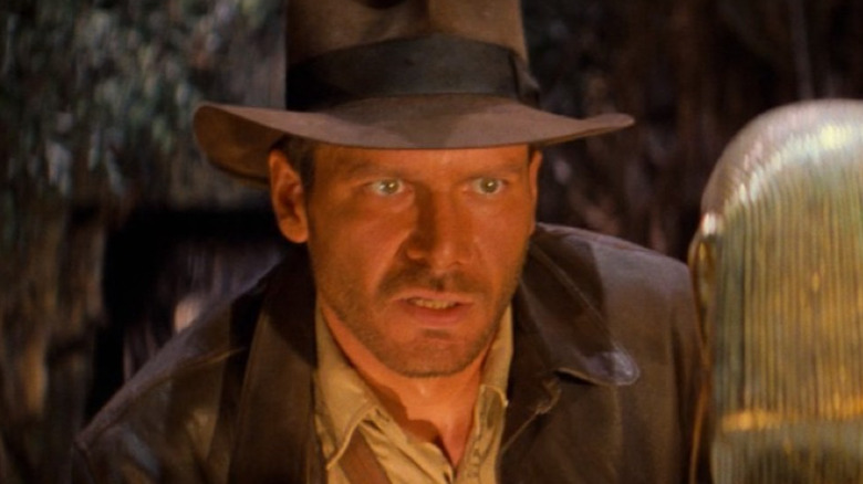 Indiana Jones considering an idol