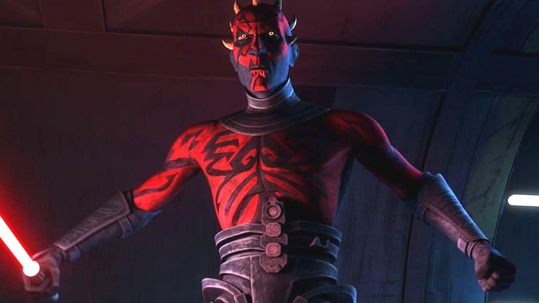 Maul holding a lightsaber