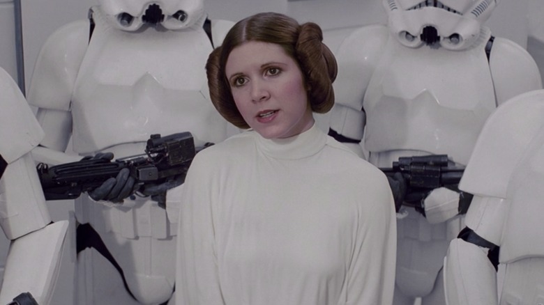 Leia flanked by Storm Troopers