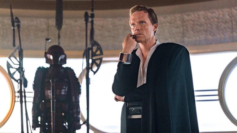 Dryden Vos stewing in his hideout in "Solo: A Star Wars Story"
