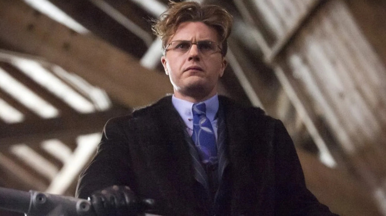 Mason Verger stands at railing