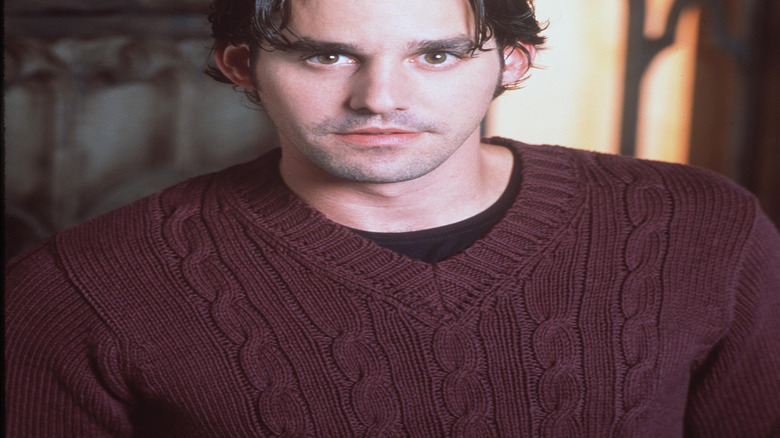 Xander stares into camera