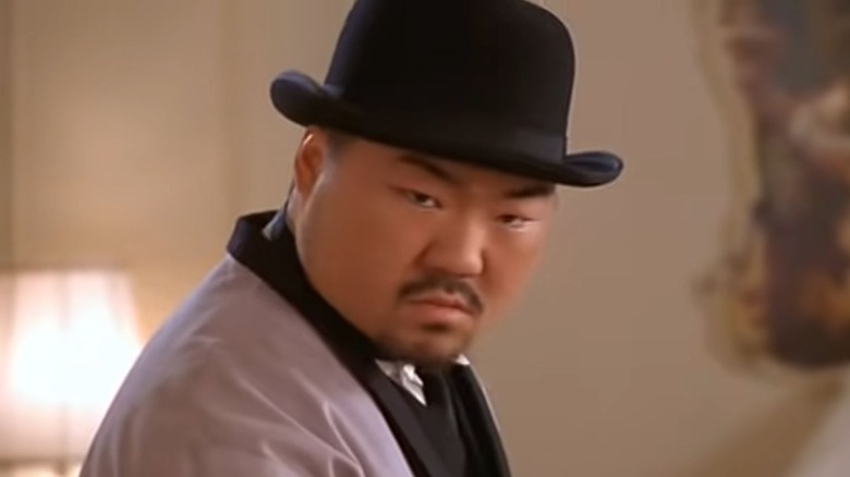 Random Task wears bowler hat in"Austin Powers: International Man of Mystery" (1997)