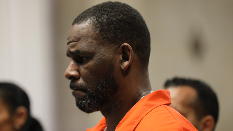 R. Kelly in orange prison jumpsuit