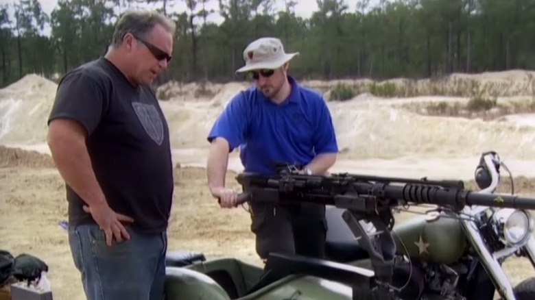 Will Hayden inspects gun bike