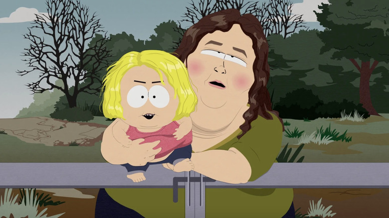 Mama June holding child