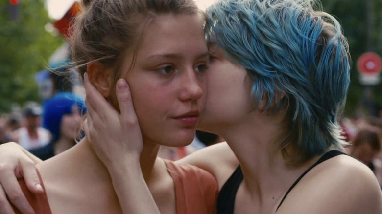 Emma kissing Adèle on the cheek in Blue is the Warmest Color (2013)