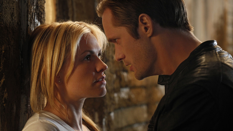 Eric and Sookie stare into each others' eyes in True Blood (2008)