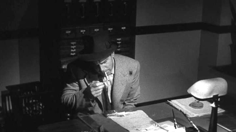 Walter Neff smoking in "Double Indemnity"