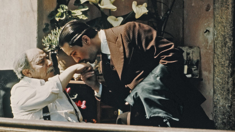 Vito kissing Don's hand in "The Godfather Part II"