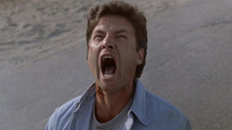 Louis Creed screaming on the road in "Pet Sematary"