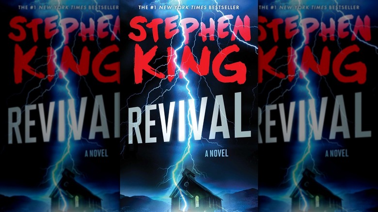 The book cover of Stephen King's Revival, featuring a lightning bolt through the author's name and title
