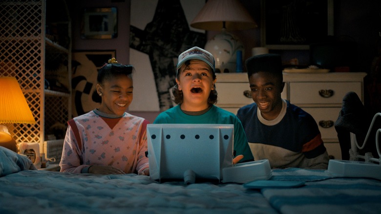Kids playing with Lite Brite