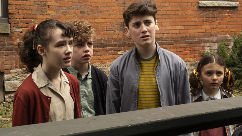 Lilly, Teddy, Phil, and Susie Welcome to Derry look concerned in 