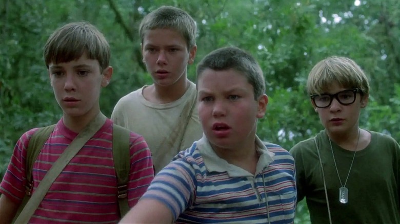 Gordie, Chris, Vern, and Teddy looking shocked in 