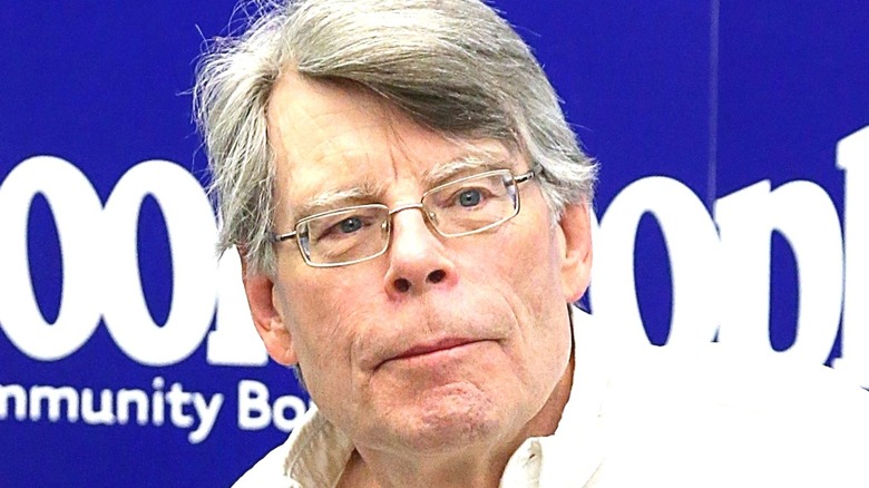 Stephen King posing at an event
