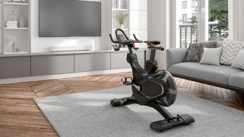 An exercise bike in the middle of a living room