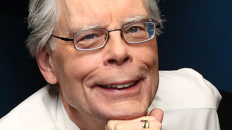 Stephen King smiles