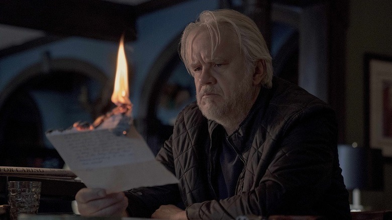 Reginald "Pop" Merrill burning a letter in "Castle Rock."