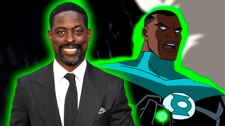 Sterling K. Brown smiling with John Stewart