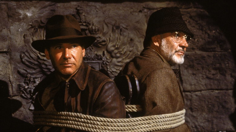Indiana Jones all tied up with his father in "Indiana Jones and the Last Crusade" (1989)