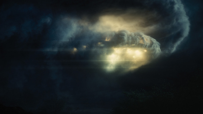 A UFO emerging from the clouds in "Disclosure Day" (2026)