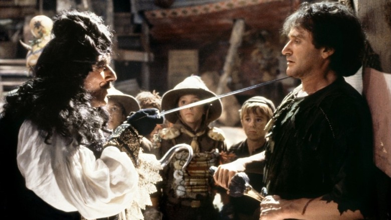 Hook's Pete Banning dressed as Peter Pan with pirate attacking him