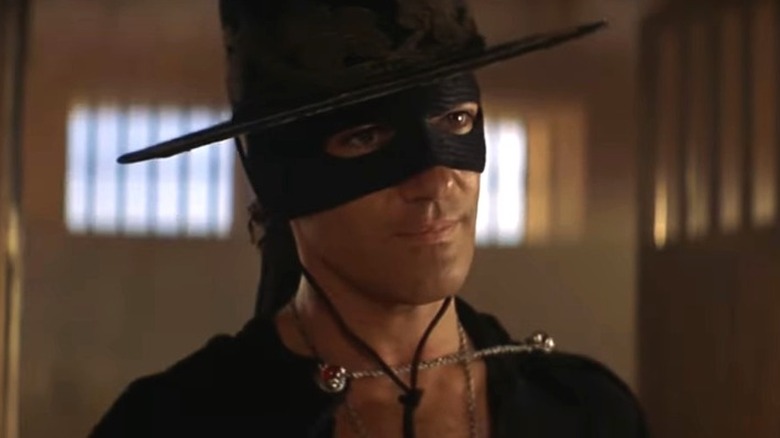 Zorro stands in a doorway