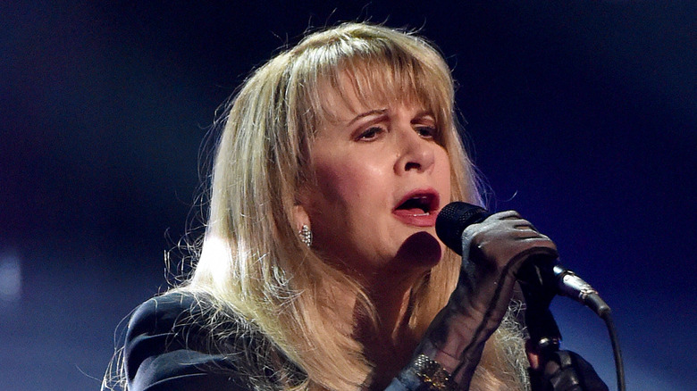 Stevie Nicks singing on stage