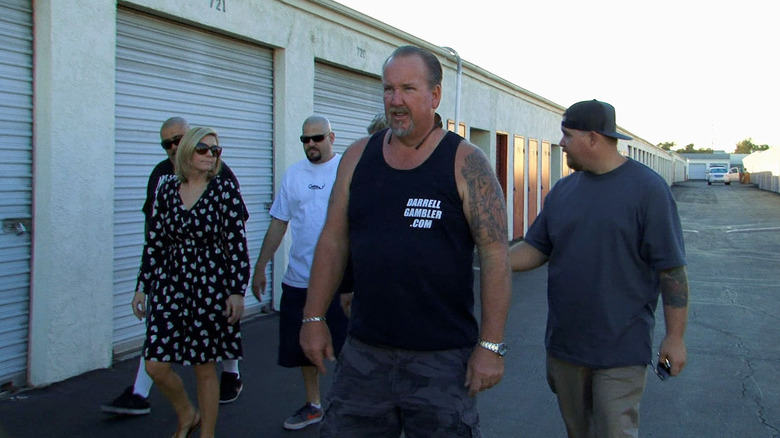 Darrell Sheets and other bidders approaching storage lockers