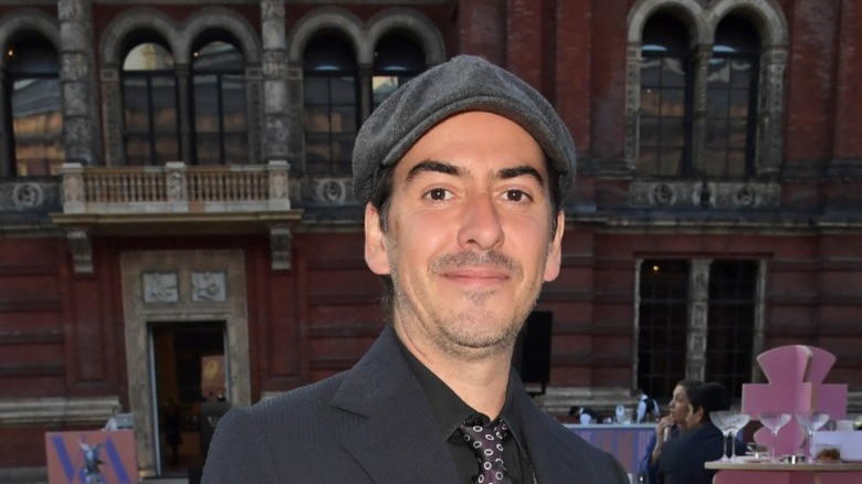 Dhani Harrison smiling outside
