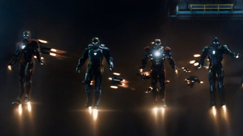 Several Iron Man suits flying