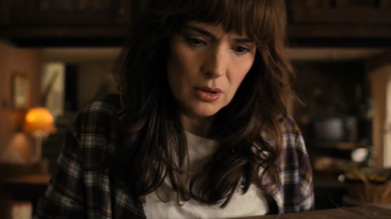 Joyce Byers wears plaid shirt