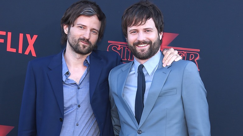 Matt and Ross Duffer standing together