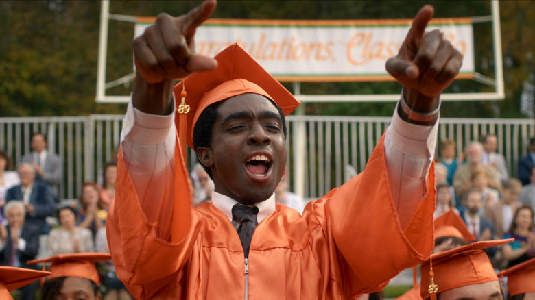 Lucas cheers Dustin's speech in "Stranger Things"