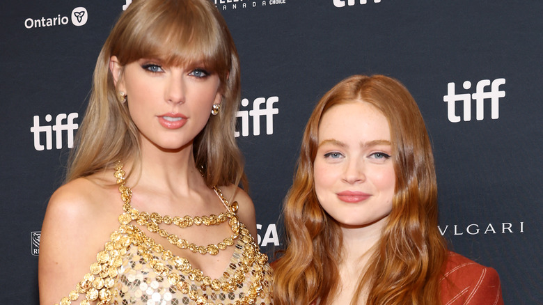 Taylor Swift and Sadie Sink on a red carpet