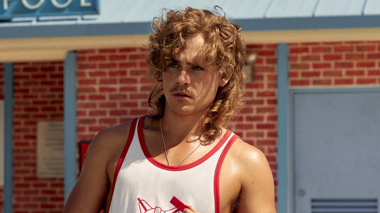 Dacre Montgomery posing in Stranger Things