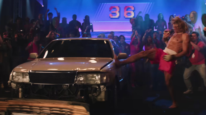 Ken kicking a car in Street Fighter