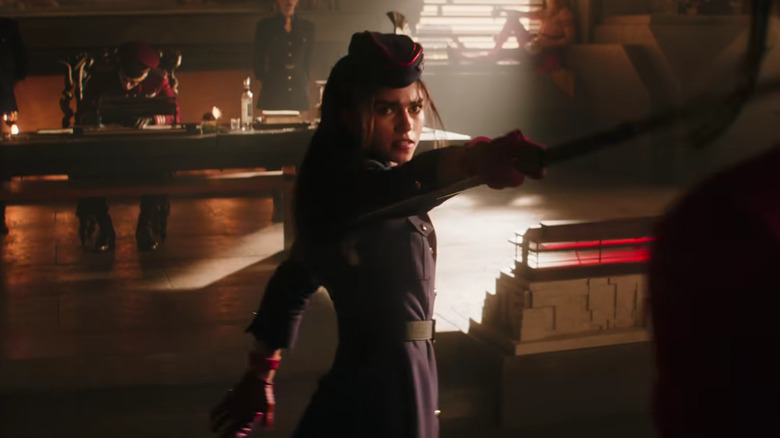 Juli wielding a staff in Street Fighter