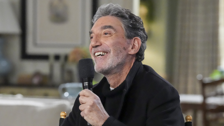 Chuck Lorre smiling at Warner Bros. Press Day in 2026