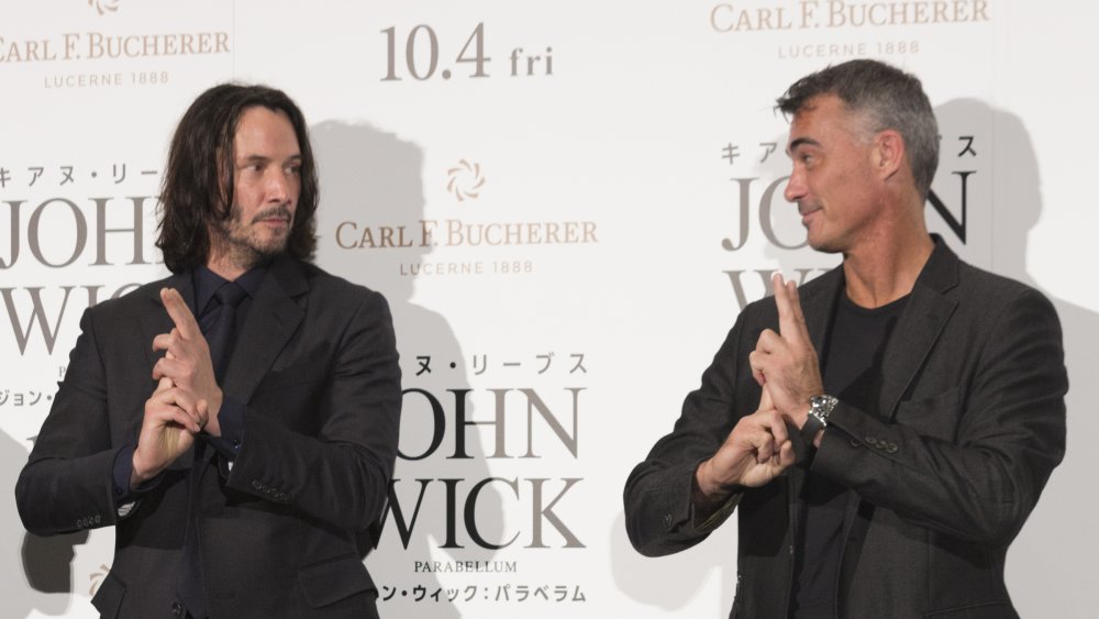 Chad Stahelski and Keanu Reeves making finger guns