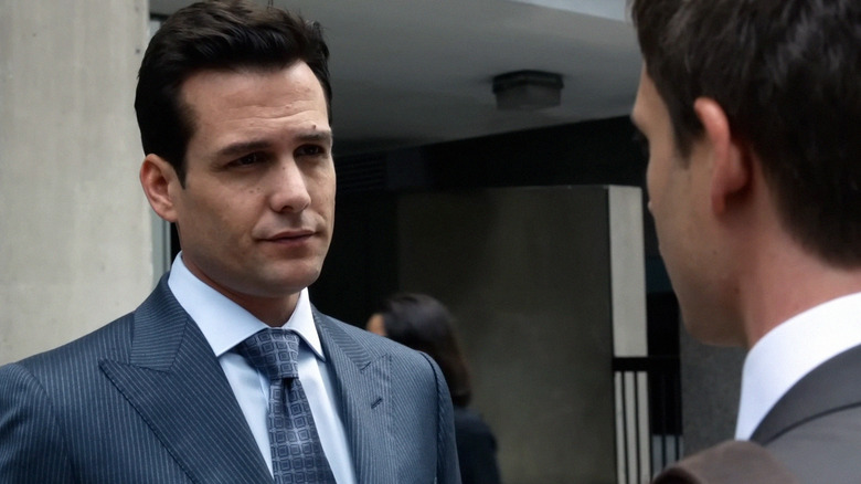 Harvey looking at Mike